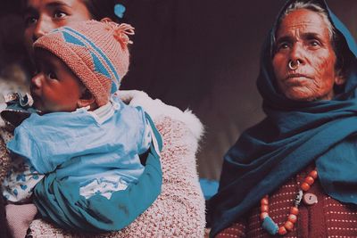 Portrait of mother and daughter during winter