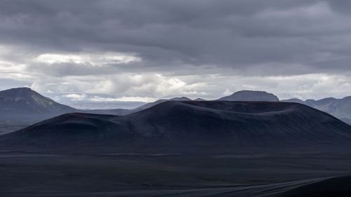 Panoramic view of volcanic landscape against sky