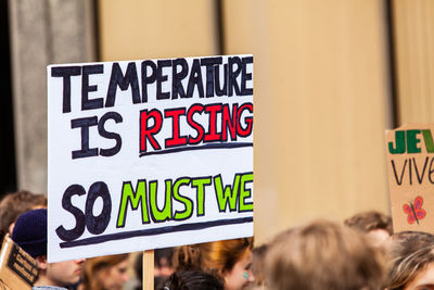 Close-up of poster against sky