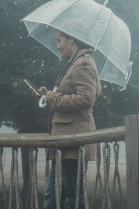 Woman holding umbrella