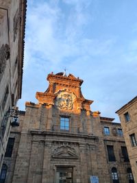 Low angle view of old building against sky