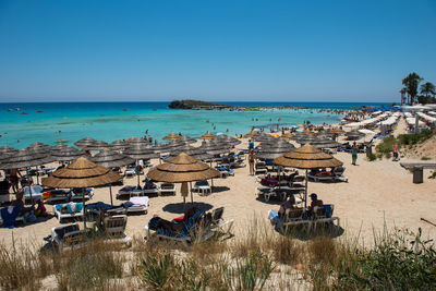 Panoramic view of people on beach