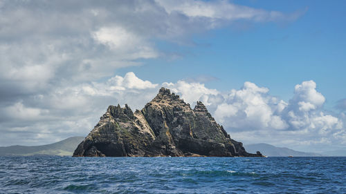 Scenic view of sea and rocks against sky