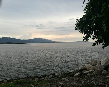 Scenic view of lake against sky during sunset