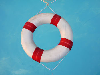 Inflatable ring floating in swimming pool