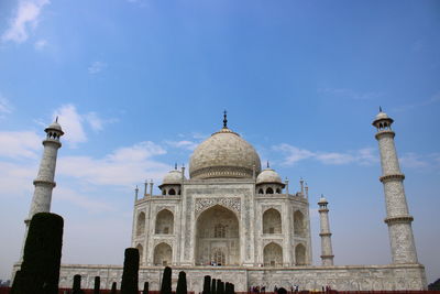 Low angle view of the taj mahal against blue sky