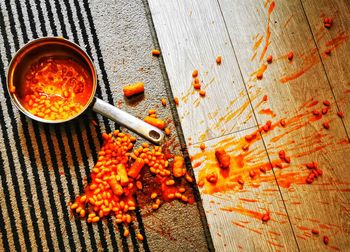 Directly above shot of split baked bean accident