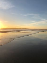 Scenic view of sea against sky at sunset