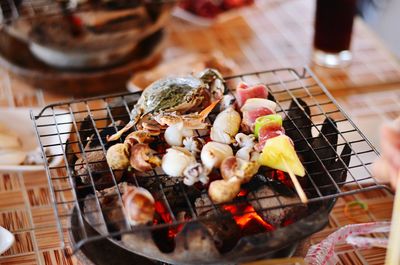 Close-up of food on barbecue