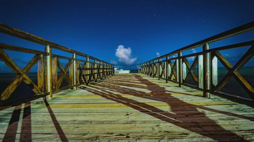 Pier against blue sky