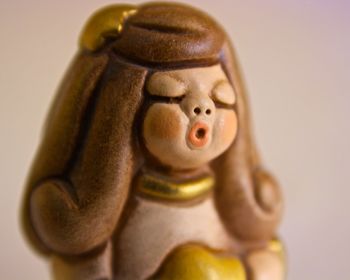 Close-up of stuffed toy against gray background