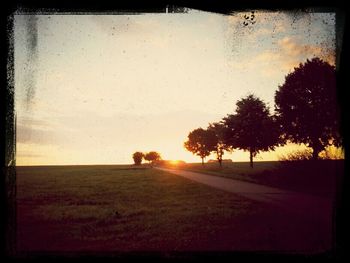 Scenic view of landscape at sunset