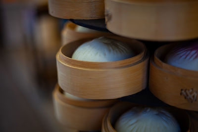 Close-up of objects for sale at market stall in chinatown 