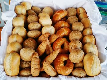 High angle view of breads in container at bakery