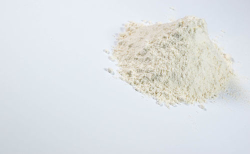 High angle view of bread against white background