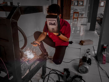 Cropped image of man standing in factory