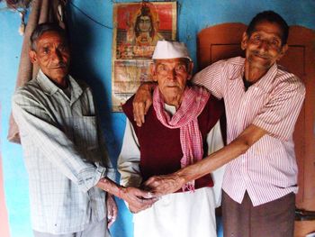 Portrait of people on wall