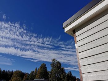 Low angle view of building against blue sky