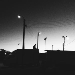 Low angle view of street light against clear sky