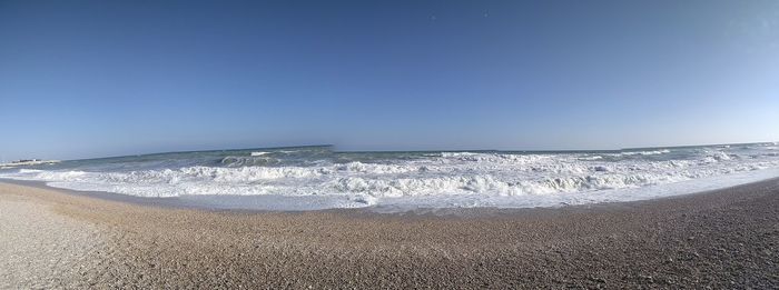 Scenic view of sea against clear sky