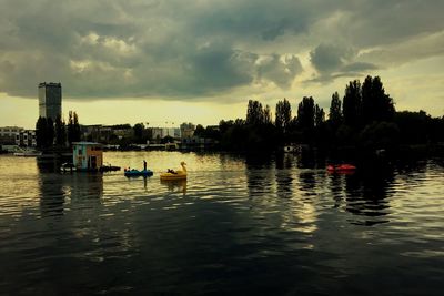 Scenic view of lake against sky during sunset