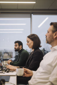 Business colleagues working late in office