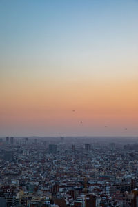 High angle view of townscape against sky during sunset
