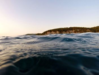 Scenic view of sea against clear sky