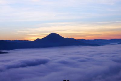 Scenic view of mountains against sky during sunset