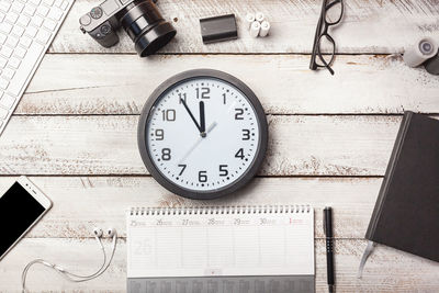 Directly above shot of clock on table