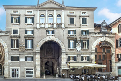 The beautiful piazza dante in verona with historic buildings with beautiful facades