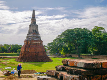 View of temple against cloudy sky