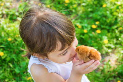 Close-up of girl with dog