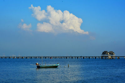 Boat in sea against sky