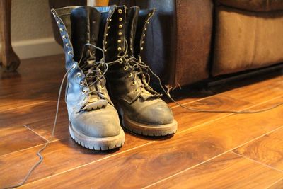 Close-up of boots on floor