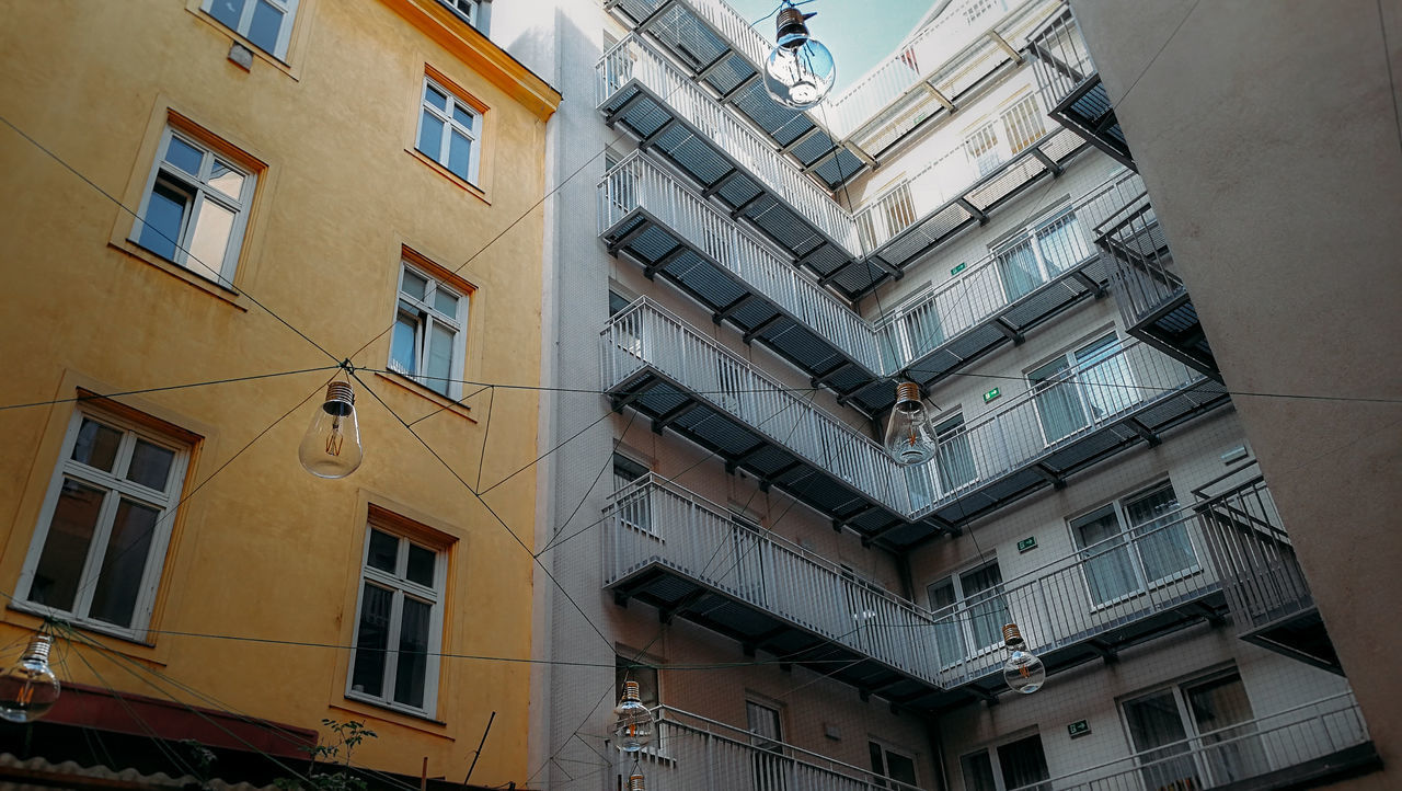 LOW ANGLE VIEW OF RESIDENTIAL BUILDINGS IN CITY