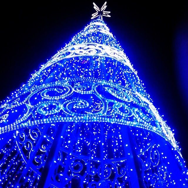 illuminated, night, decoration, low angle view, christmas, pattern, christmas decoration, christmas lights, design, christmas tree, close-up, celebration, lighting equipment, blue, religion, tradition, indoors, decor, art and craft