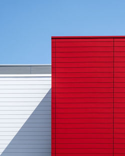 Low angle view of building against blue sky