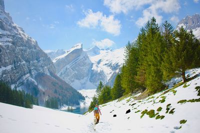 Scenic view of snowcapped mountains against sky