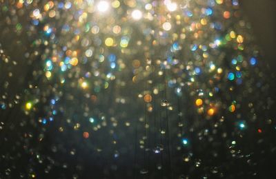 Defocused image of illuminated lights at night