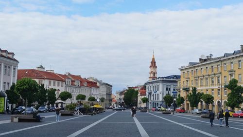 Road along buildings in city