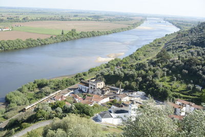 High angle view of river amidst buildings