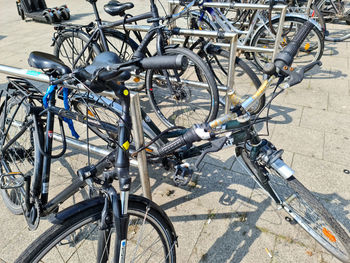 High angle view of bicycle parked on footpath