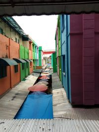 View of empty alley amidst buildings