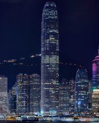 Illuminated city lit up at night