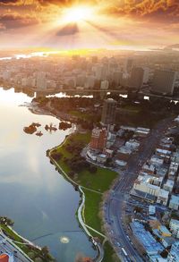 Aerial view of landscape against sky during sunset
