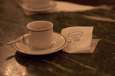 Close-up of coffee cup on table