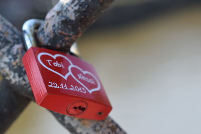 Close-up of red lock on metal