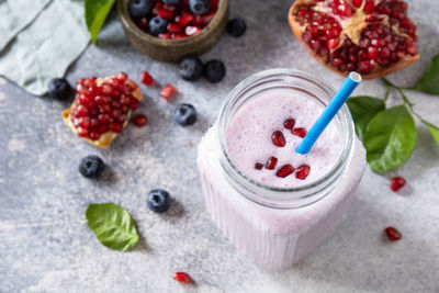 Vegan protein smoothie made from pomegranate and blueberry 