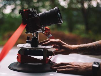 Man setting up camera